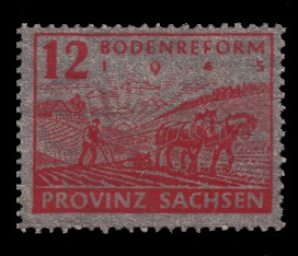 12 Pf Briefmarke: Bodenreform (Pflügender Bauer) auf Zigarettenpapier 12 Pf Briefmarke: Bodenreform (Pflügender Bauer) auf Zigarettenpapier
